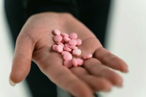 Close-Up Shot of a Person Holding Medicines